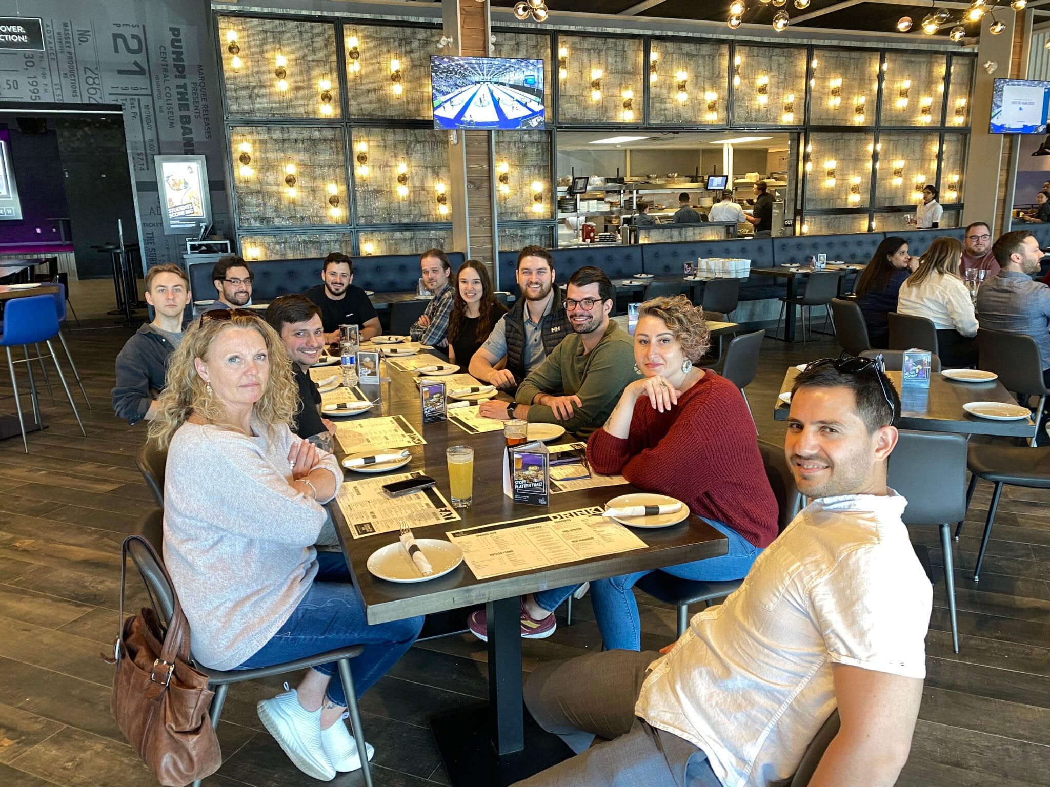 team sitting down for lunch at the rec room team sitting down for lunch at the rec room